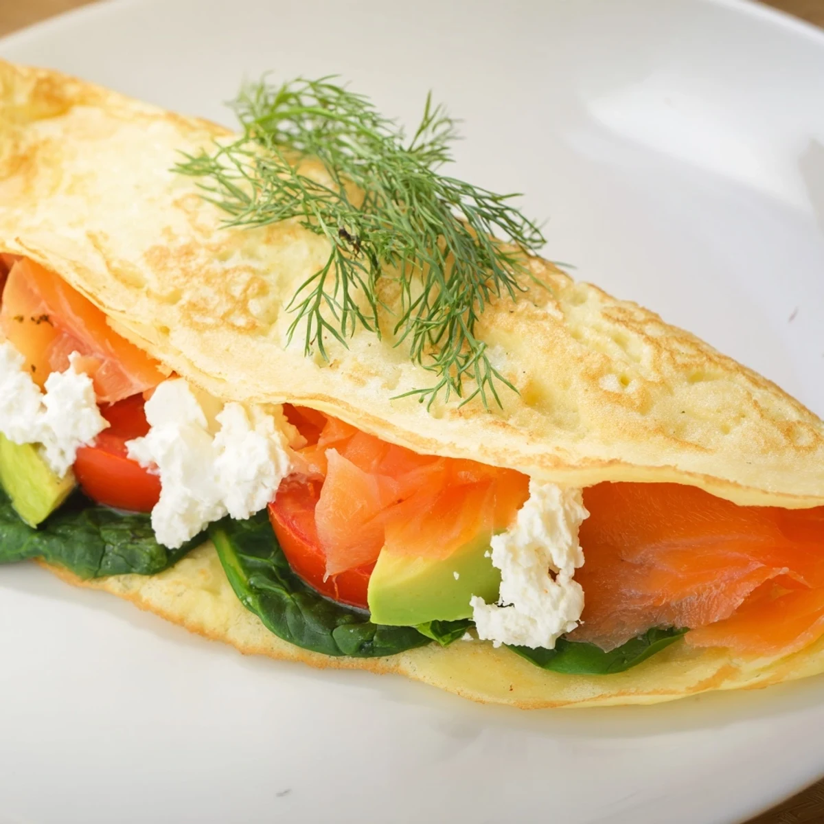 Savory Blender-Egg Crepe Wrap with smoked salmon and feta, a delightful light breakfast idea.