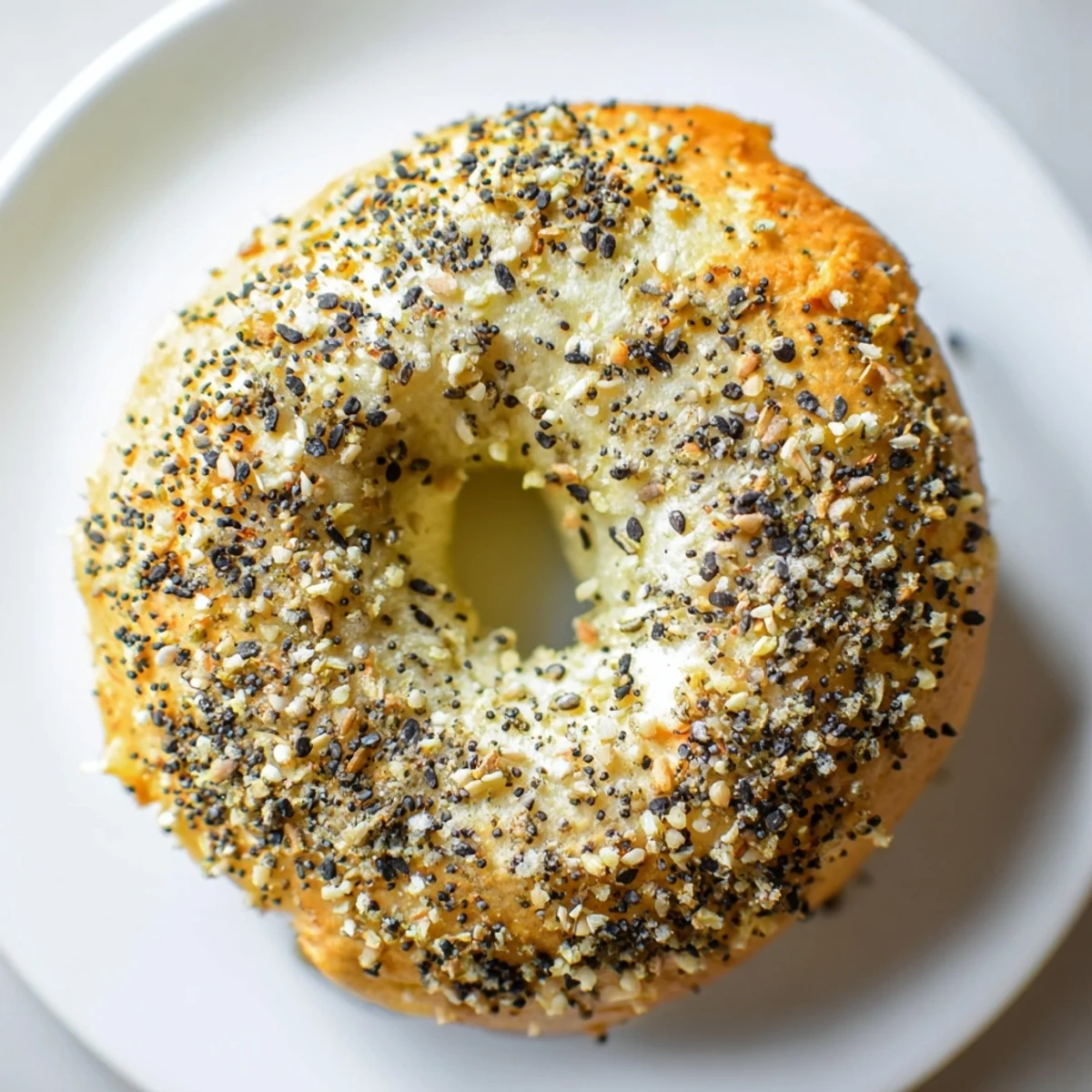 Golden brown Everything Bagel Yogurt Bagels, fresh from the oven, ready to be topped with cream cheese.