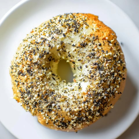 Golden brown Everything Bagel Yogurt Bagels, fresh from the oven, ready to be topped with cream cheese.